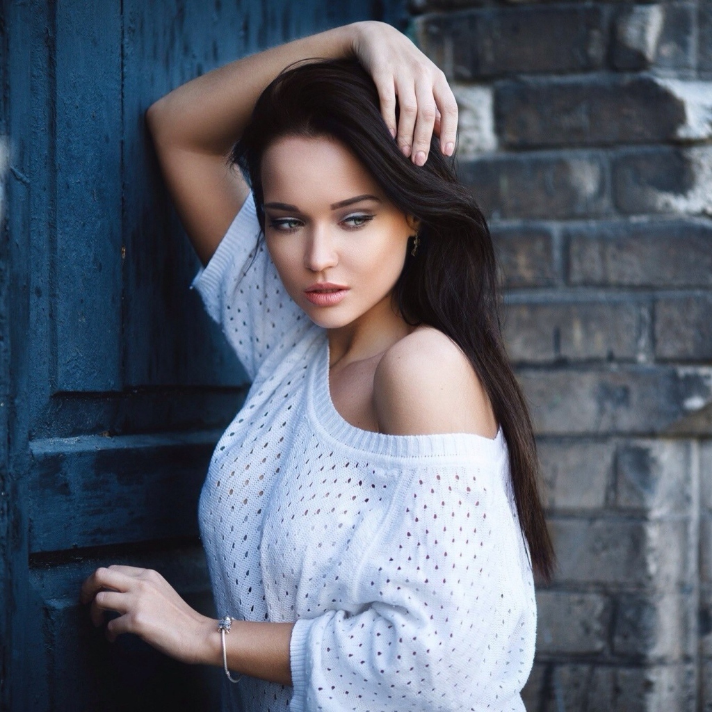 Model Angelina Petrova in white sweater
