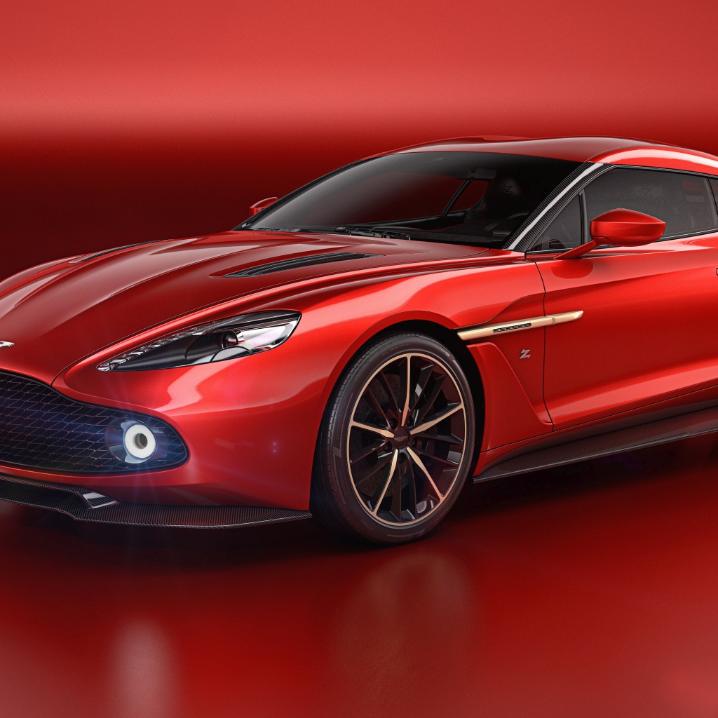 Стильный красный автомобиль Aston Martin Vanquish Zagato на красном фоне 