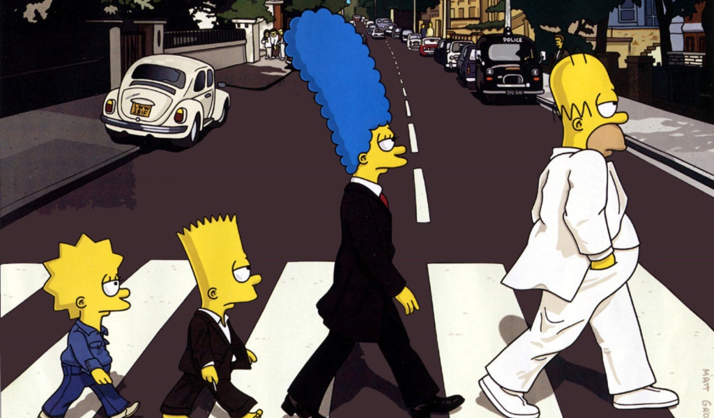 Семья Симпсонов в костюмах переходит дорогу