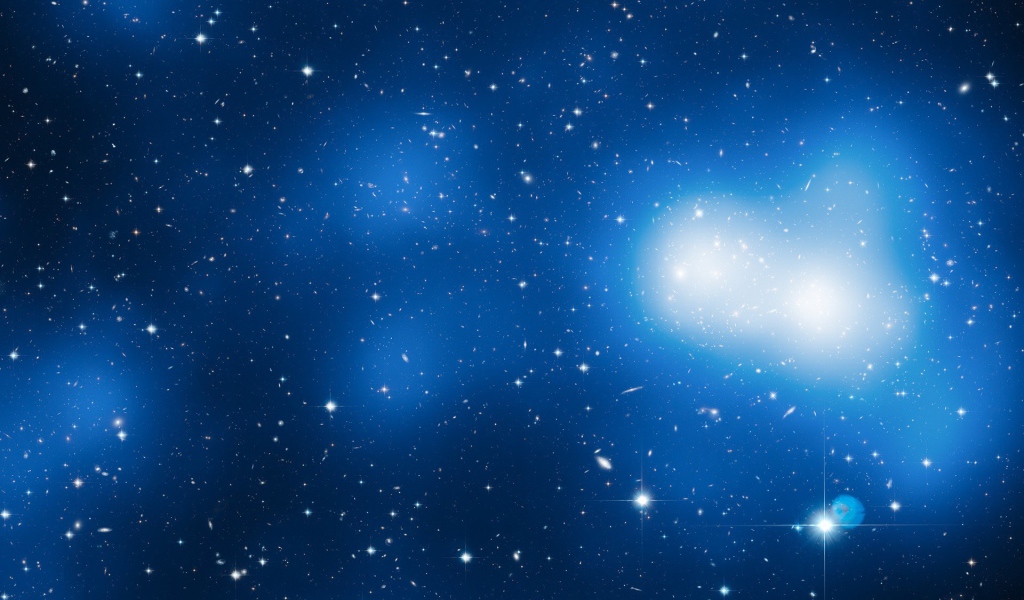 Звезды и галактики в голубом космосе