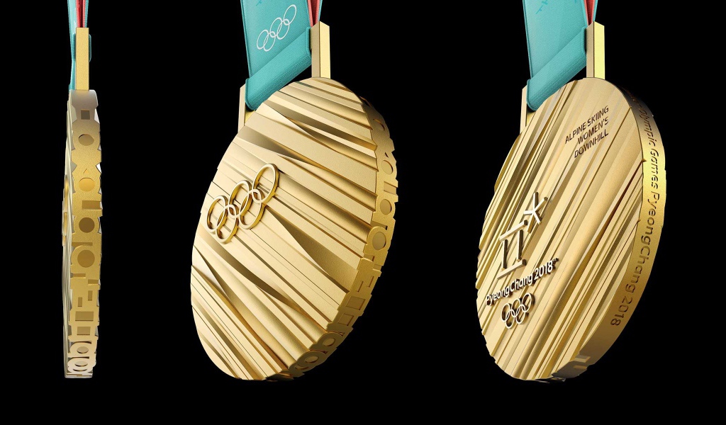 Золотая медаль зимних Олимпийских игр 2018 на черном фоне