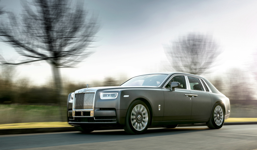 Expensive car Rolls Royce Phantom, 2018 at speed