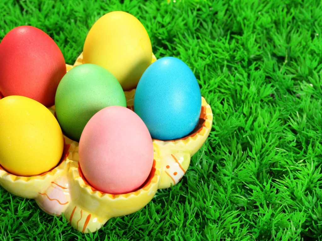 Colorful eggs on grass for Easter