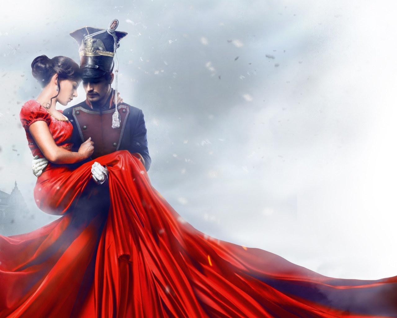 Улан держит на руках девушку в красном платье