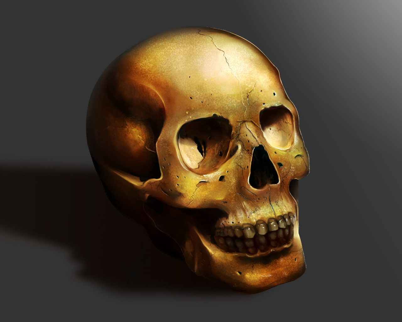 Golden skull on a gray background