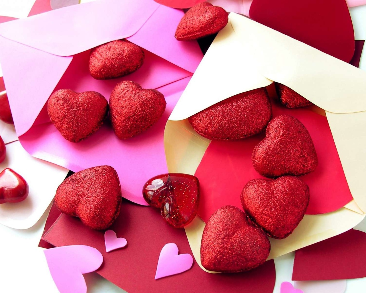 Red hearts in colored envelopes 