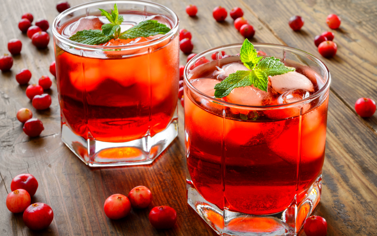 Refreshing drink with cranberries and mint