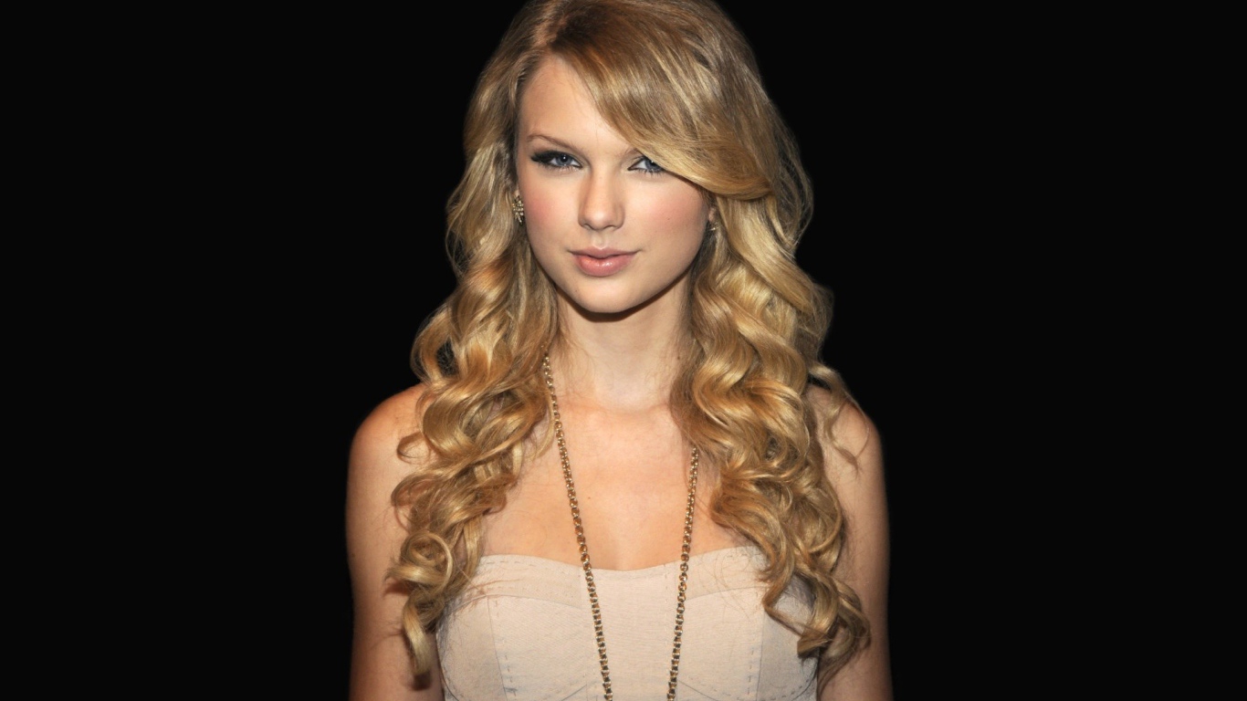 Taylor Swift in black background