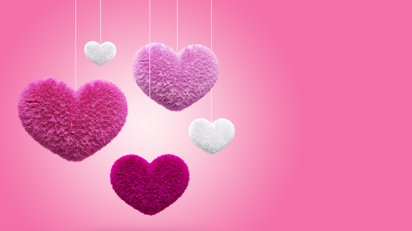 Soft fluffy hearts on a pink background