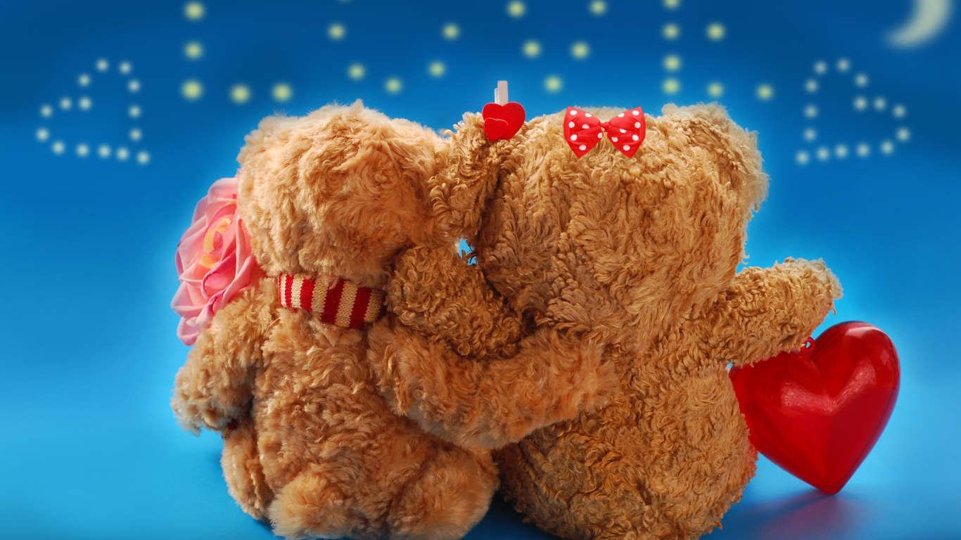 Два влюбленных медвежонка Тедди на фоне надписи Любовь