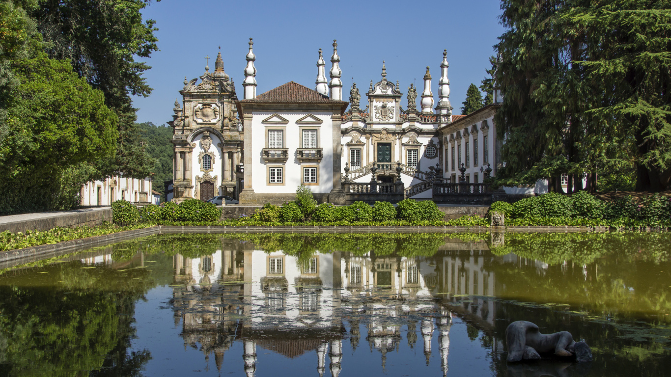 Mateusz Palace is reflected in the pond, Portugal