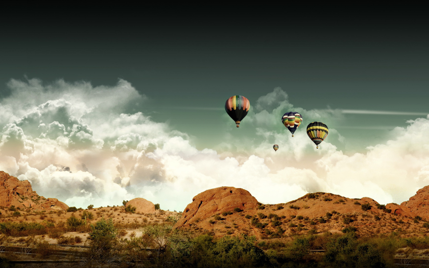Воздушные шары над холмами