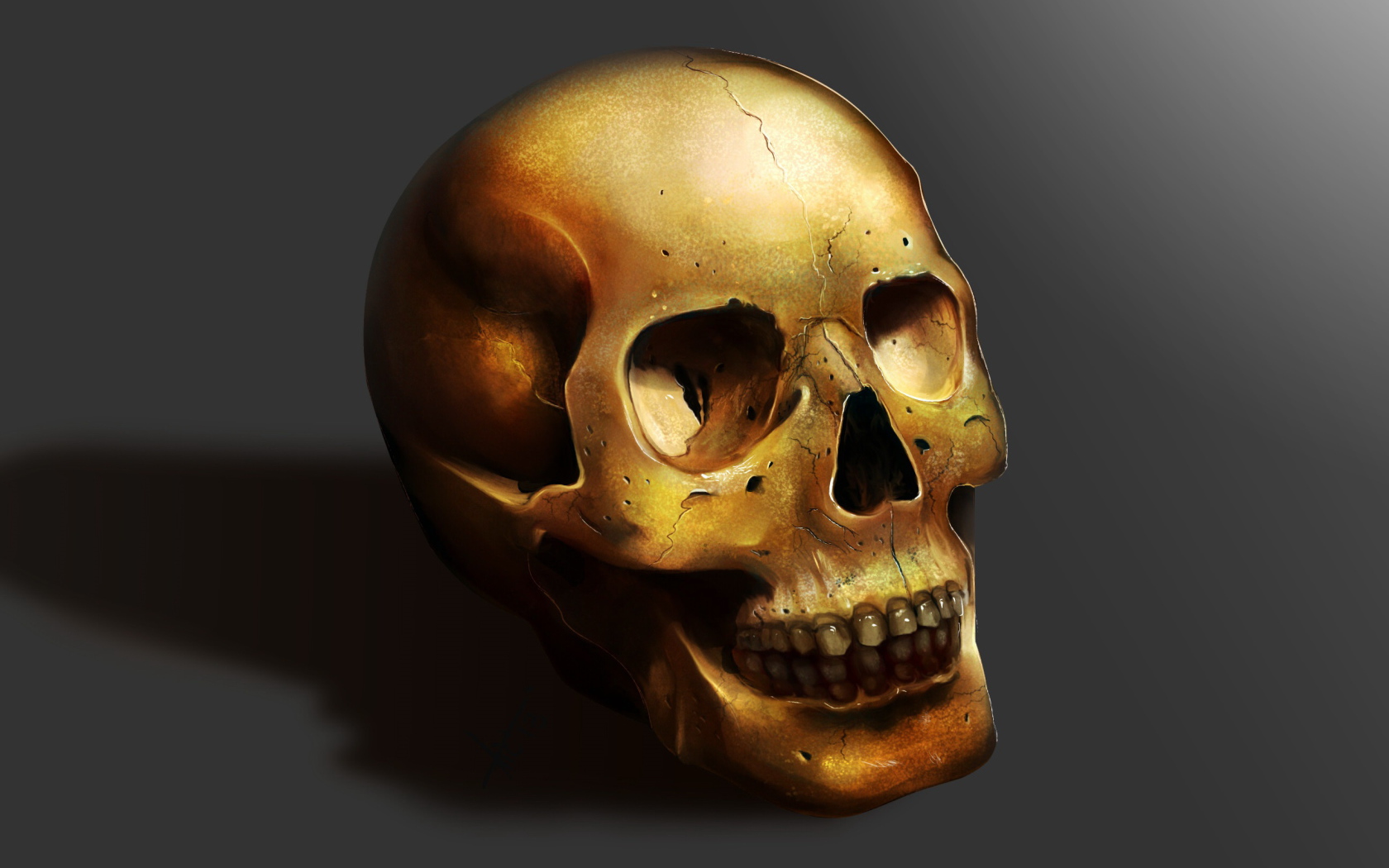 Золотой череп на сером фоне