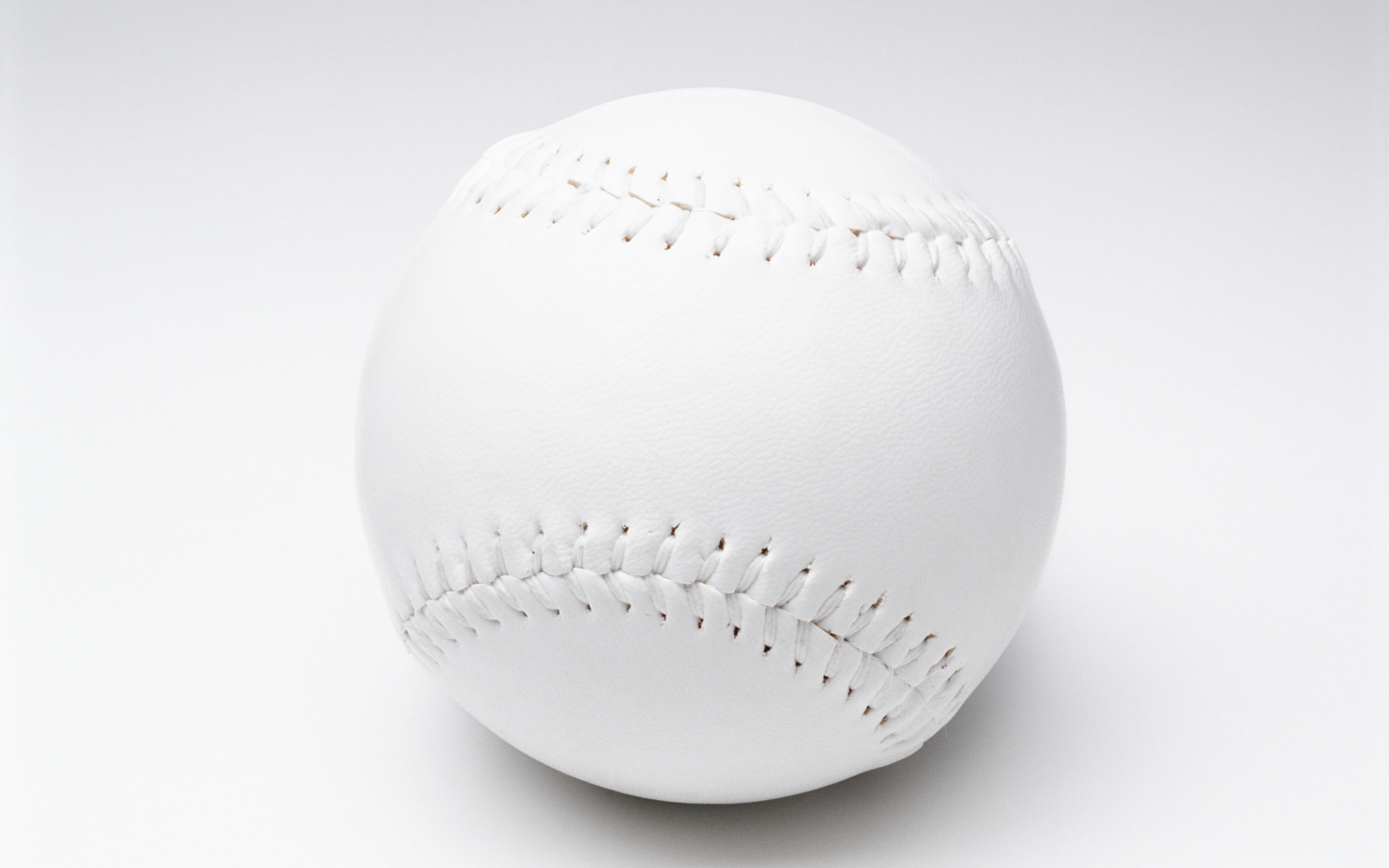 White baseball ball on a white background