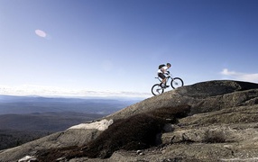 The cyclist in mountains
