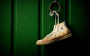 Converse shoe on the door