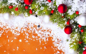 Праздничная декорация на оранжевом фоне на рождество