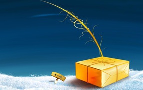 Жёлтая подарочная коробка лежит на снегу на рождество