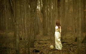 	 The girl in the woods with a globe