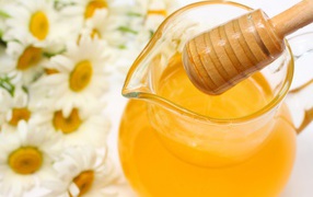 Yellow honey in a jar