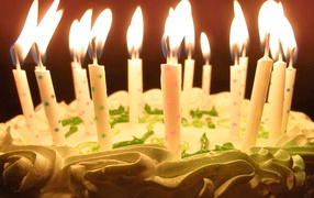 Burning candles in a cake for birthday