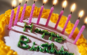 Cake with green inscription on birthday