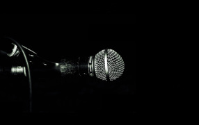 Professional microphone on a black background