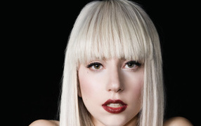 Singer Lady Gaga on a black background