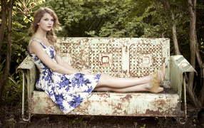 Taylor Swift on the old bench
