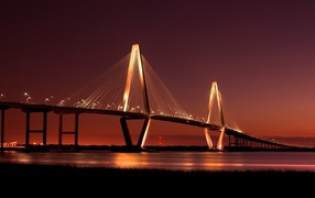 The bridge is lit at night