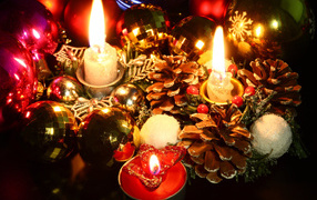 Candles, pine cones and Christmas tree decorations