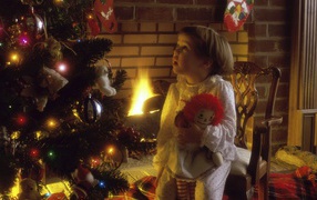 Kid at the Christmas tree