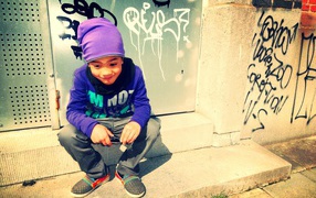 A boy in a purple hat, swag