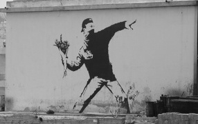 Graffiti, a bouquet of flowers, the artist Banksy