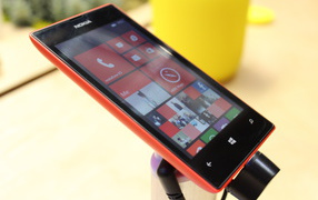Red Nokia Lumia 520 on the stand