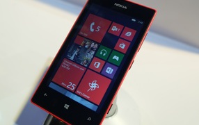 Red Nokia Lumia 720 on the stand