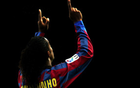 The football player of Atletico Mineiro Ronaldinho on the black background