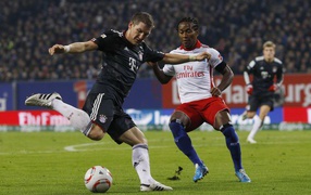 The player of Bayern Bastian Schweinsteiger superior strike
