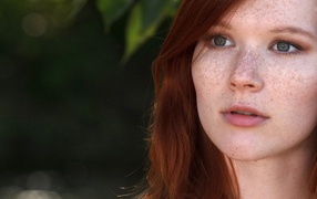 Beautiful girl with freckles