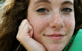 Blue-eyed girl with freckles