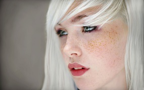 The white-haired girl with freckles