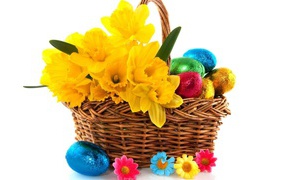 Yellow flowers and eggs for Easter