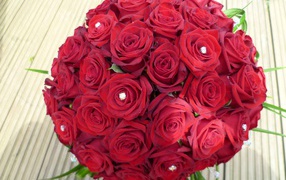 Round bouquet of red roses on March 8 to favorite
