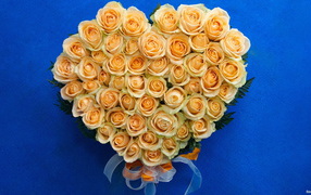 Yellow roses in the form of heart on March 8