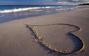 Heart on sand on Valentine's Day February 14