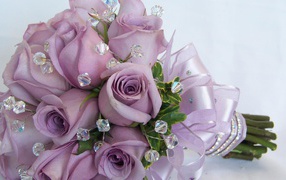 Purple roses in a wedding bouquet