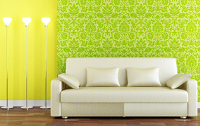 White sofa on green background oboj
