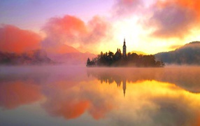 Island on the lake in the fog