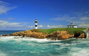 The lighthouse on the island of Ribadeo, Spain