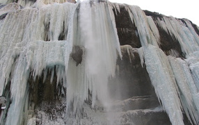 Frozen waterfall on the river Chegem
